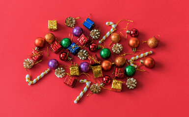 Christmas toys on a red background, horizontal photo