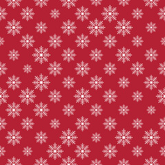 Festive white seamless snowflake texture pattern on red background, Christmas vector illustration for postcards, greeting cards, wallpaper, wrapping paper, invitations. 