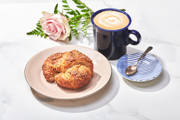 Breakfast Scene with Croissant and Latte on Marble Table