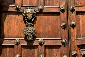 old door knocker spanish door in cusco,peru