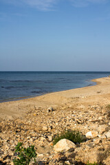 Beautiful empty beach. Seascape  with clear sky and tranquil water. Winter in Middle East. 