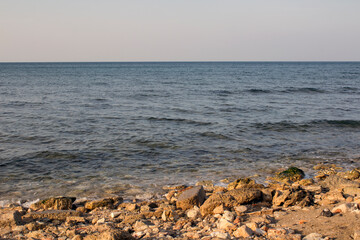 Beautiful empty beach. Seascape  with clear sky and tranquil water. Winter in Middle East. 