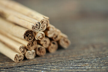 cinnamon sticks and anise on a wooden background