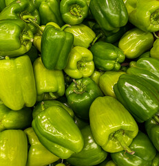 Delicious vegetables at the weekend market . Green juicy pepper