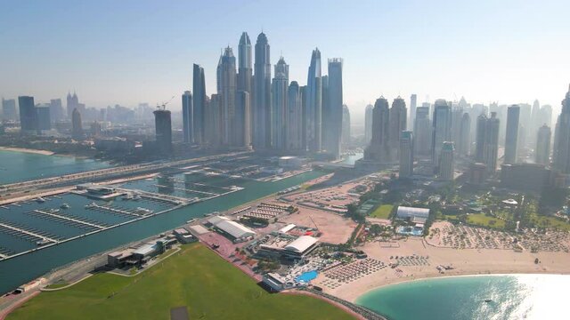 Dubai Marina skyscrapers and popular JBR beach in the UAE aerial view