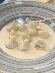 Georgian khinkali in sauce