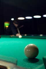 snooker ball and man with 
cue