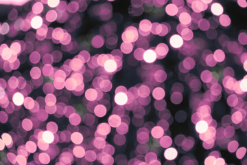 Purple defocus lights on a black background.