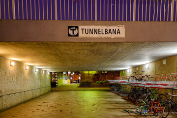 Stockholm, Sweden An underpass and sign for the tunnelbana or subway in Axelsberg.