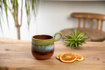colorful coffee cup on wooden table