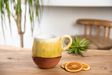 colorful coffee cup on wooden table