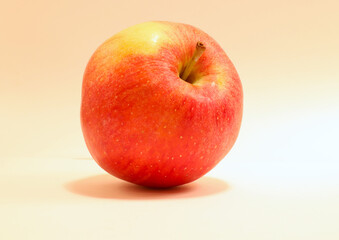 Close up on one red and yellow apple. Swedish fruit. Isolated on a white background. Stockholm, Sweden.