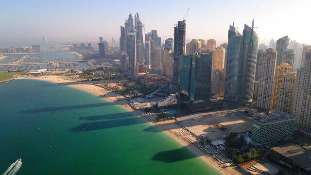 JBR beach and Dubai Marina skyscrapers aerial view