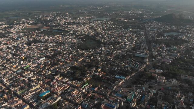 Aerial flyover beautiful city of Tiruvannamalai during sunlight in nature,India.