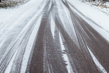 road in winter, tire tread mark on the snow..icy condition.Snow.Winter tire