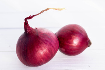 red onion on a white background, two pieces