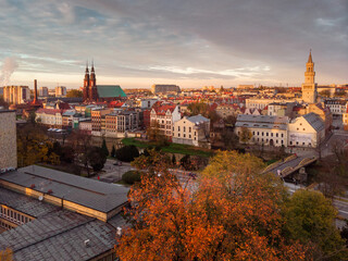 Obraz premium A drone view of the historic city with the market square, churches and town hall in Opole during the Autumn in Silesia, Opole, Poland.