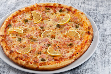 fresh pizza on the white plate
