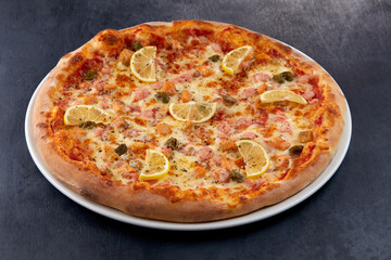 fresh pizza on the white plate
