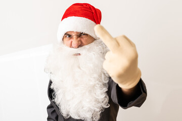 santa laughs and shows a finger on a white background
