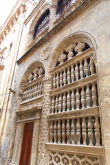Naklejka premium Stone side of Granada cathedral and pinnacles