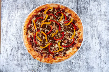 fresh pizza on the white plate