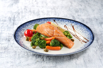 salmon steak with roasted vegetables