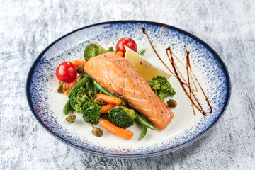 salmon steak with roasted vegetables