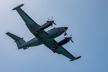large propeller-driven aircraft. Large propeller-driven transport aircraft at air show .