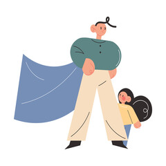 Happy young father in superhero costume standing and defending small daughter