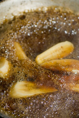 Bananas foster Dessert. Classic Creole or Cajun dessert favorite. Bananas sautéed in butter and caramelized sugar and served with cookies, whipped cream, cake, ice creams and chocolate syrup.