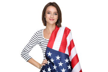 Beautiful young woman wrapped in american flag on white background