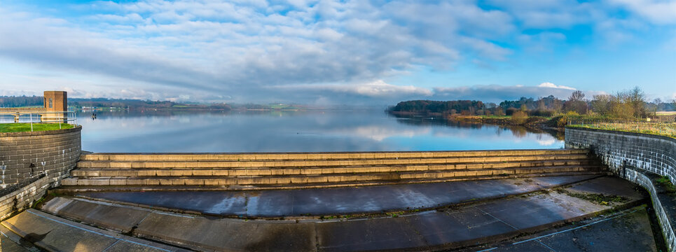 A panorama view across the overflow towards the waters of Pitsford Reservoir, UK in winter
