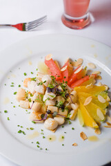Scallops. Sautéed scallops seared in butter, garlic, shallots, red wine, tarragon, salt and pepper and served with toasted baguettes. Classic French bistro entree.