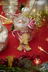 Gingerbread Man on the table with christmas decorations
