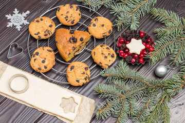 Christmas still life of cookies with  fir branches, dough for baking cookies and cookie cutter molds
