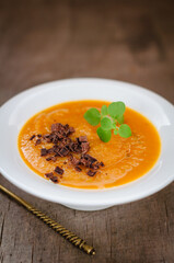 Spicy Pumpkin Soup Garnished with Chocolate