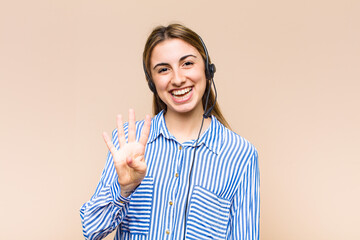 blonde pretty woman smiling and looking friendly, showing number four or fourth with hand forward,...