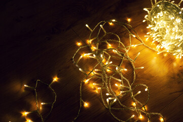 Fototapeta na wymiar A ball of christmas lights on the floor