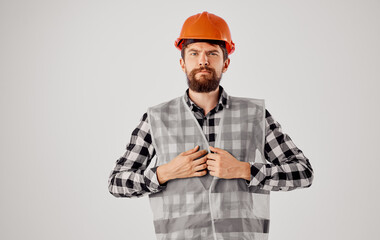 man in working uniform orange helmet construction work