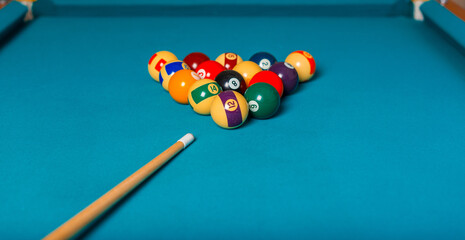 Photo of a billiard table with all items arranged.