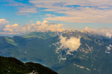 Obraz premium Beautiful mountain landscape at Caucasus mountains with clouds and blue sky