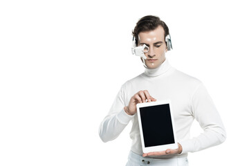 Cyborg in headphones and eye lens holding digital tablet isolated on white