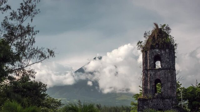 Timelapse view of historical landmark Cagsawa Ruins and Mount Mayon volcano near Legazpi City, Albay, Philippines. 