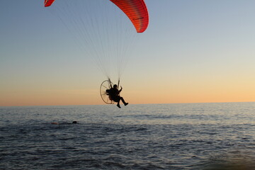 paraglider over the sea
