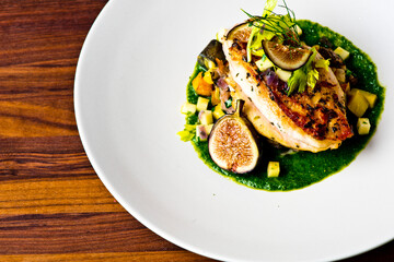 Chicken breast, pan seared to a crispy golden brown in brown butter and served with farm fresh organic vegetables: carrots, Brussels sprouts and green beans. Classic American restaurant favorite.