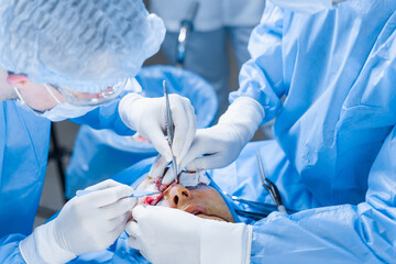 Blepharoplasty plastic surgery operation for modifying the eye region of the face in medical...