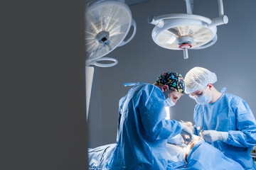 Surgeons do plastic operation in medical clinic. Surgery. Professional medecine. Skin care....