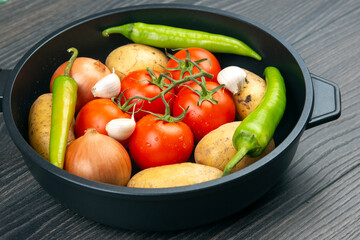 raw vegetables before cooking for frying and braising in a pan