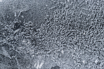 Ice crystals forming on sand grain..